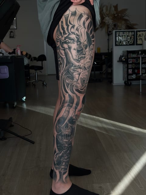 Delicate fine line botanical forearm tattoo